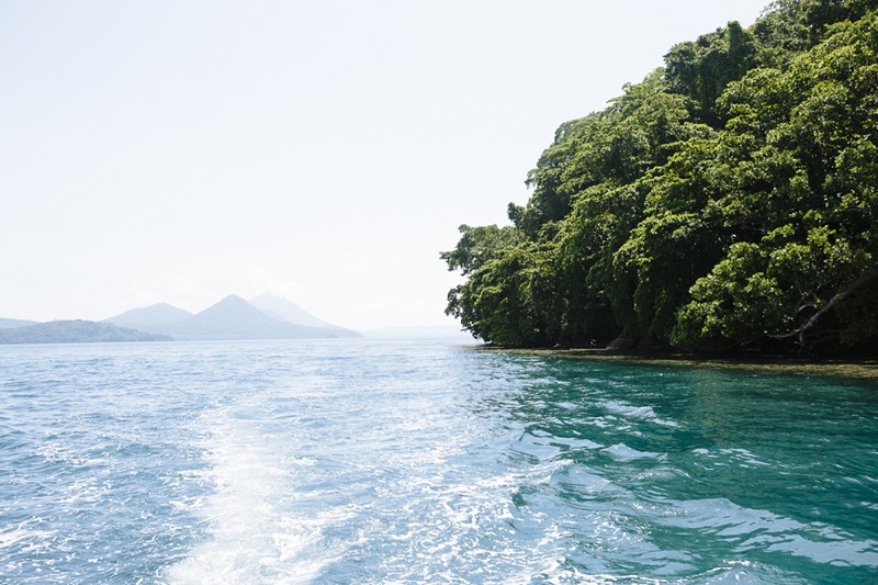 Image of beautiful blue water and a nearby island. CSIRO’s Dr Seona Meharg says communities in the Pacific are very aware of the acute impacts of climate change. Credit: Tom Greenwood 