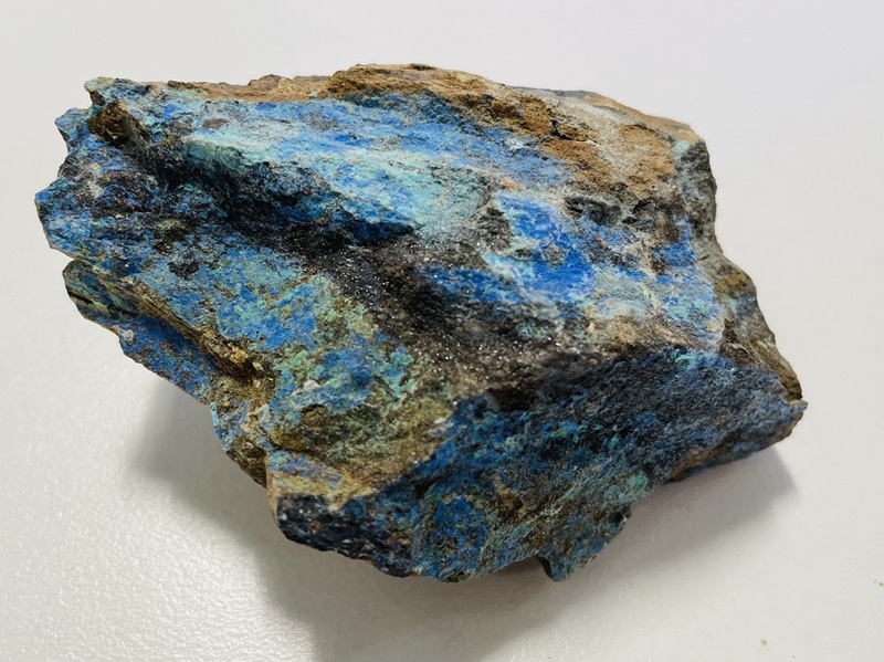 Rock displaying deep blue patches on surface