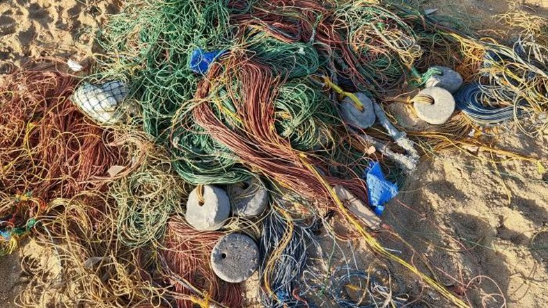 Fishing net discarded on a beach.  