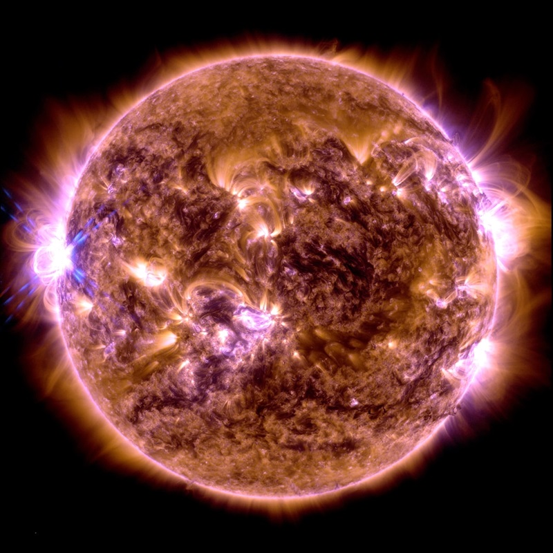 Solar Dynamics Observatory view of the Sun, with a large eruption seen at the left side of the image.