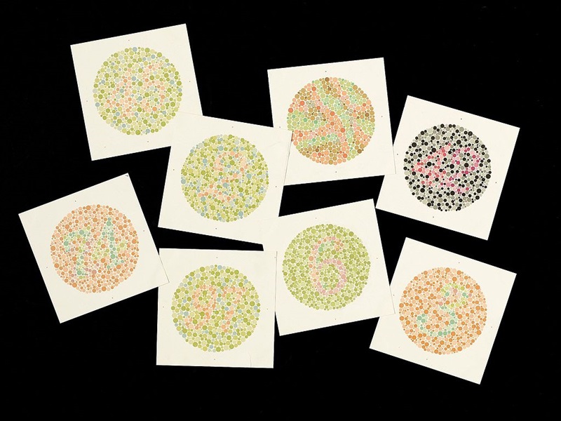 Set of eight cards showing circular images made up of different coloured dots that depict a number on a differntly coloured background