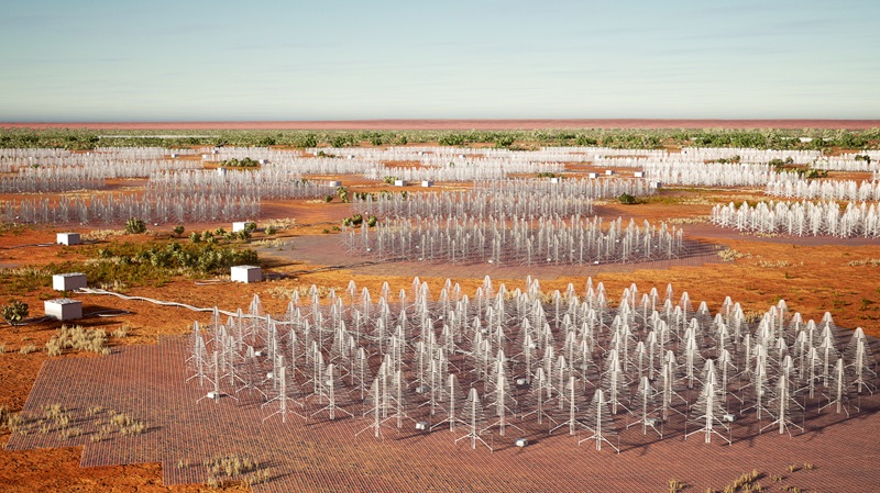 Artist’s impression of the core of the SKA-Low telescope showing many circular stations of 256 silver metal tree-shaped antennas amongst the red soil and greenery of Wajarri Country. Credit: DISR. 