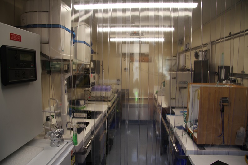 The interior of a shipping container fitted out as a laboratory to analyse seawater samples.