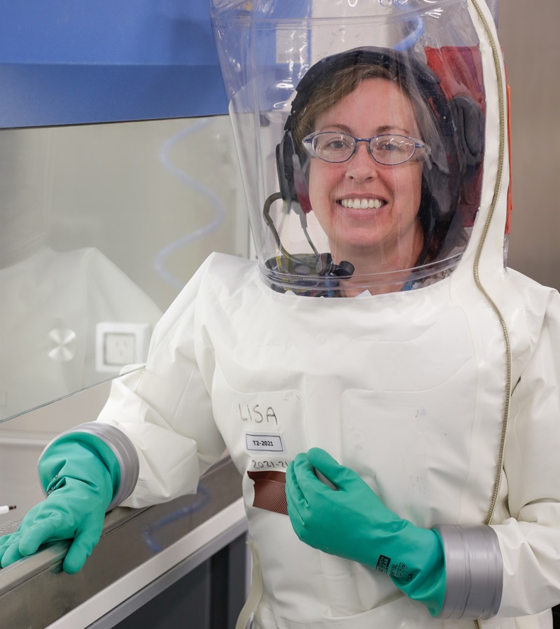 Jenn Barr in Physical Containment Level 4 protective gear