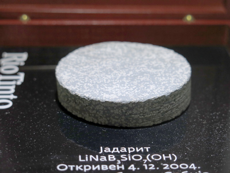 Disc of greyish white rock