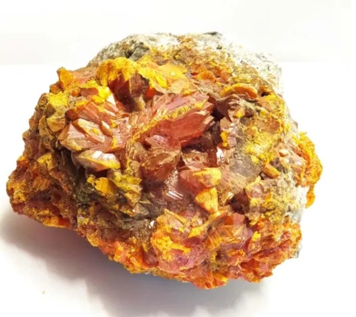 Rock showing distinct ornage-red crystals