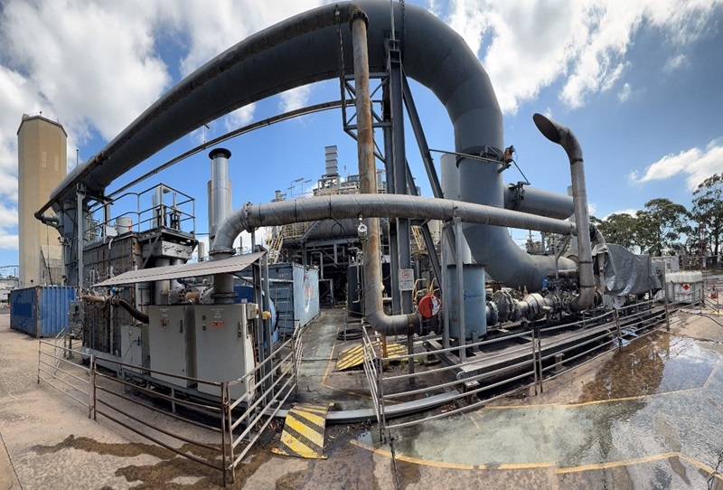 Fisheye view of an industrial installation at an underground coal mine, showing a CataVAM unit connected to ventilation infrastructure used to capture and treat methane-rich air.