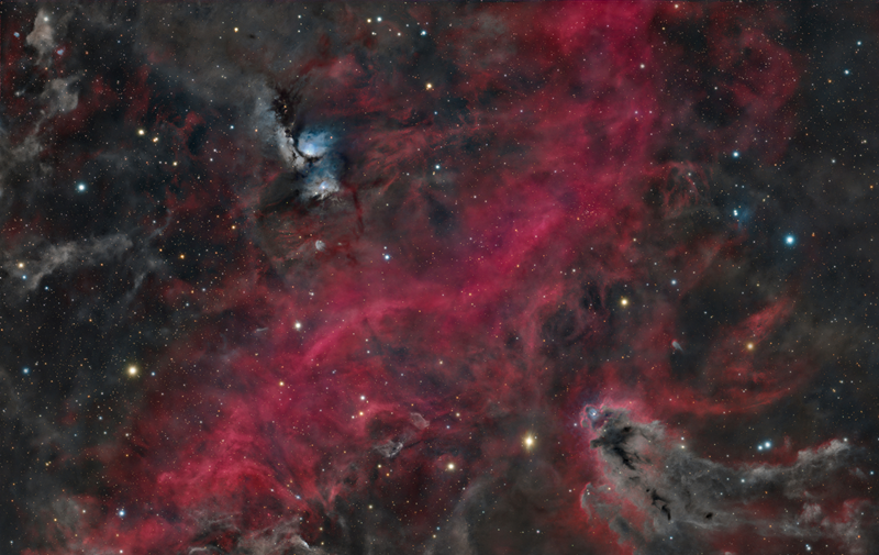 A deep red sky within a galaxy.