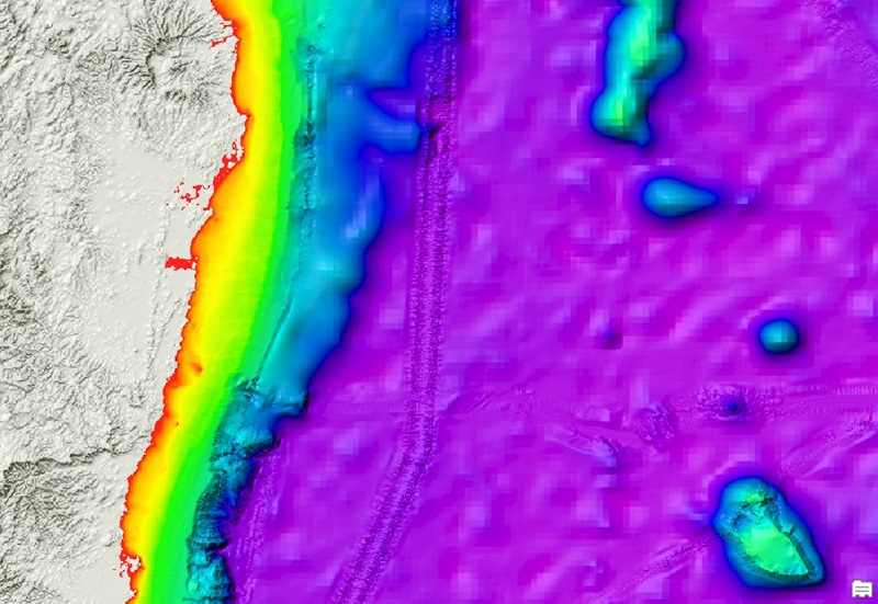 A colourful image of the seafloor with depth shown by colour.