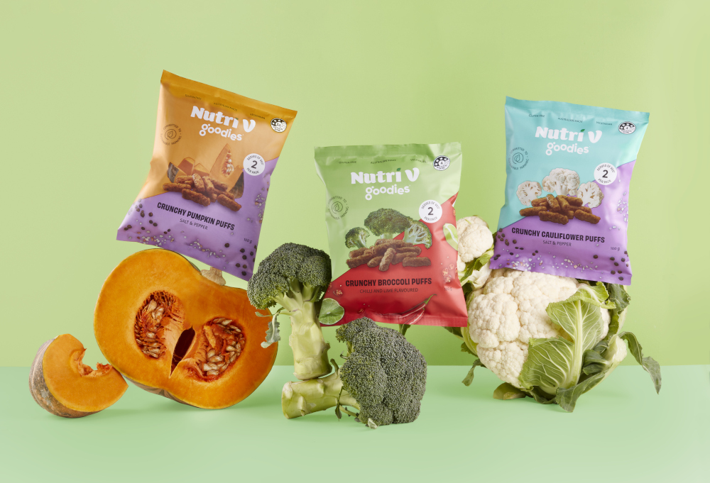 Packets of Nutri V snacks with the vegetables they are made out of – pumpkin, broccoli and cauliflower.