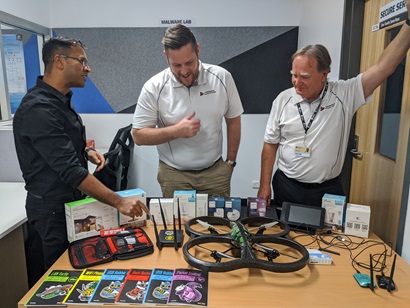 Strategic Group's Aron Robertson and Peter Spiers discussing Internet of Things devices with Professor Kallol Krishna Karmakar from the University of Newcastle.
