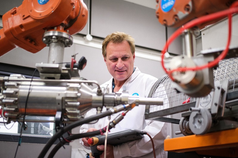 A scientist with machinery