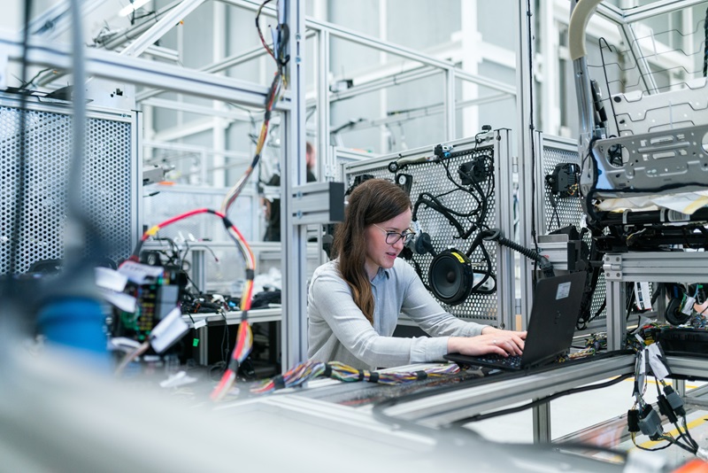 Female engineer working in a fact