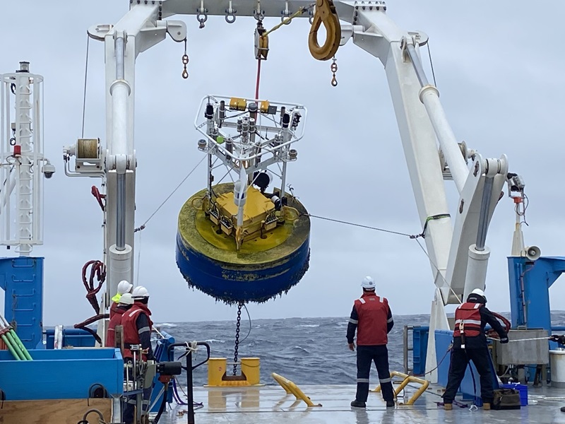 Scientists pulling up a sentinel from the Southern Ocean