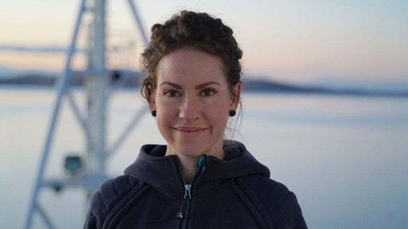 Tegan Sime is a Voyage Manger. She stands here on the Investigator ship. 