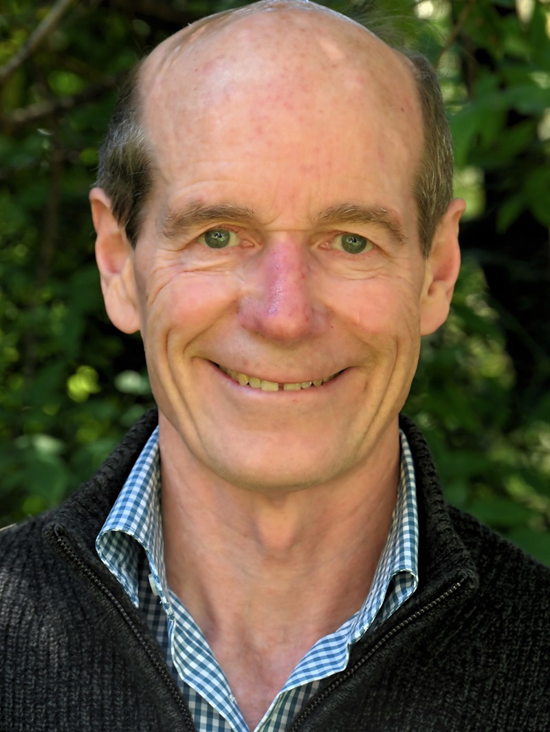 Tony Murphy looks at the camera and smiles.