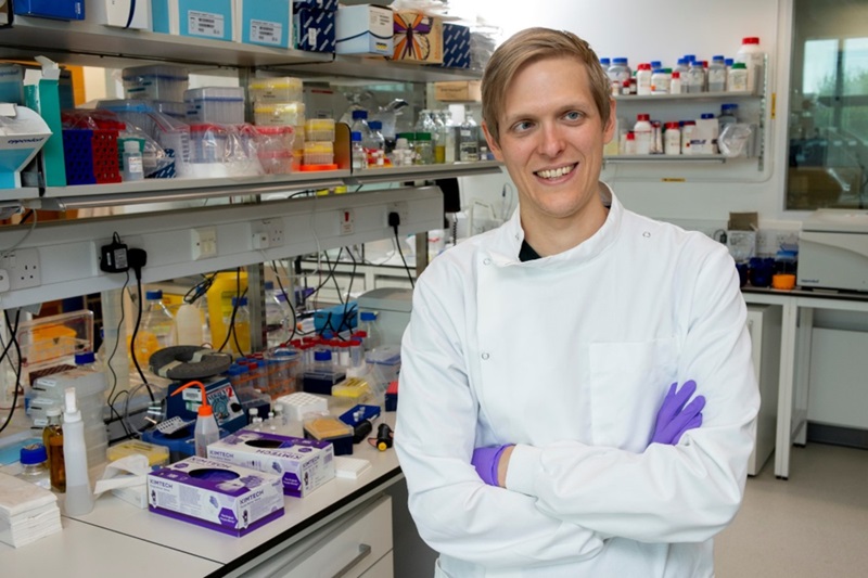 Undergraduate Research Opportunity Program alumni Ben in a lab