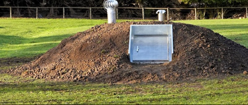 Accredited bunkers shown in the ground after being installed.