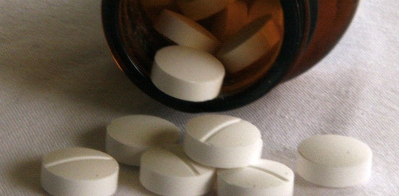 Bottle of pills spilled over