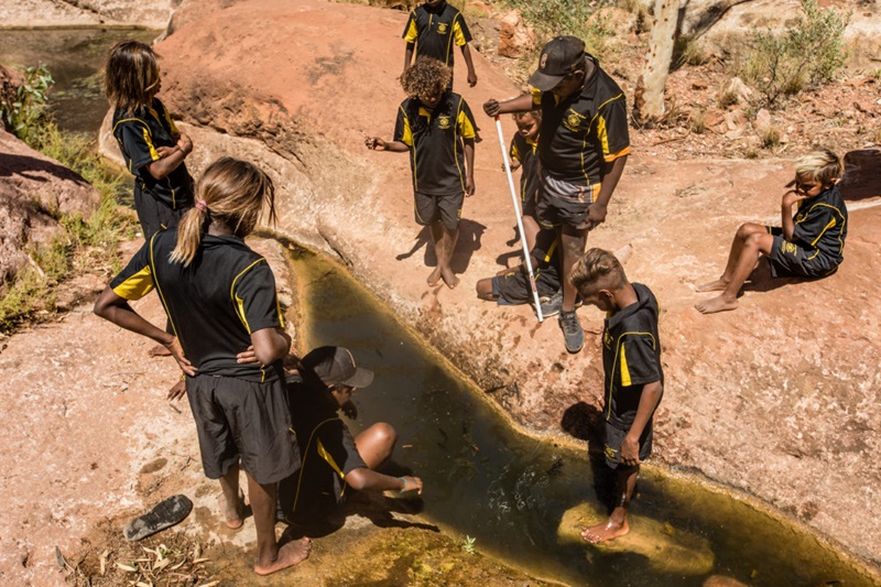 Areyonga School students at Manta-manta waterhole. Areyonga School recently won the pretigious 2018 Indigenous STEM School Award.