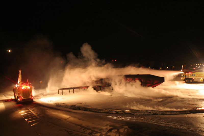 plane fire being put out uring retardant