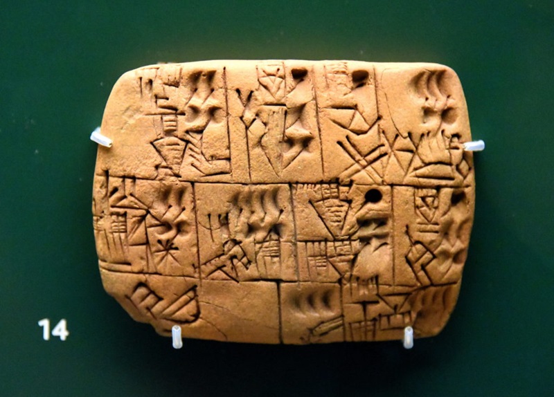 An ancient tablet engraved with symbols