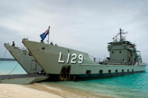 A navy landing craft on a beach