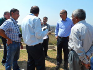 Group of 5 people talking outside