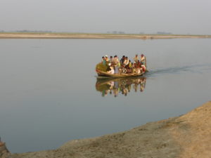 a crowded boat on a river