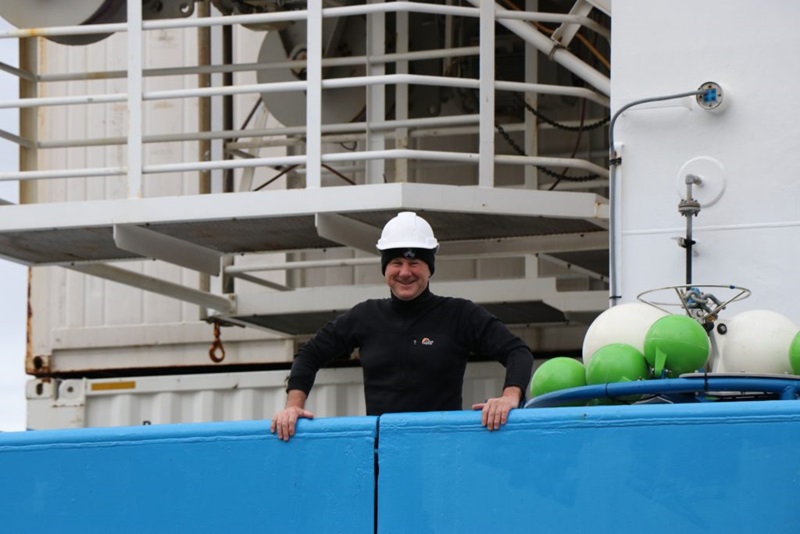 man in a hard had onboard a boat