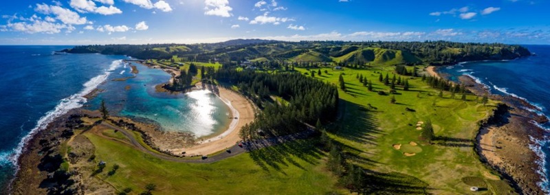 Aerial photo of a golf course on Norfolk Island, the ocean and grassed areas