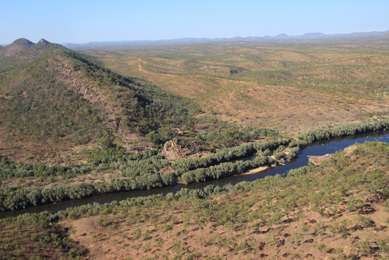 aerial of river and hill crop