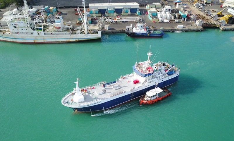Drone image of a fishing vessel in port