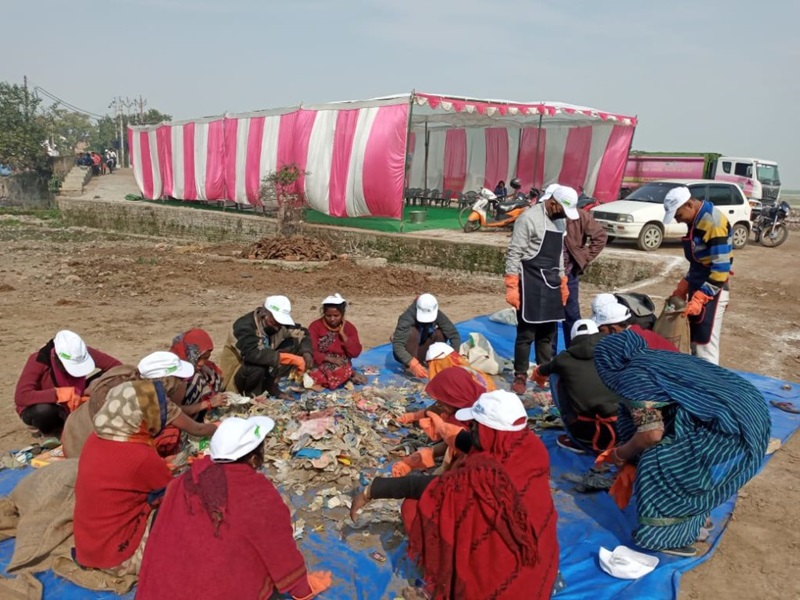 Volunteers gather for a clean up drive Prayagraj in Uttar Pradesh and sort through plastic waste.