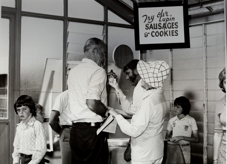 A group of people trying food products