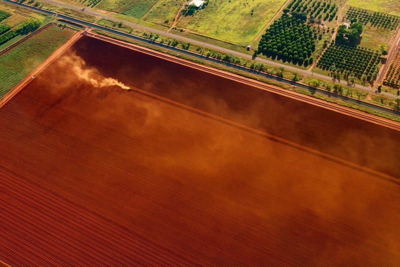 Aerial view of soil being prepared on agricultural land