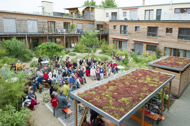 A community gathers around energy efficient buildings in Freiburg, Germany. Image by Daniel Schoenen.