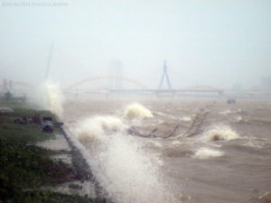 river waters lash at bank in cyclone