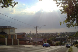 Sun rays bear down on a Melbourne street