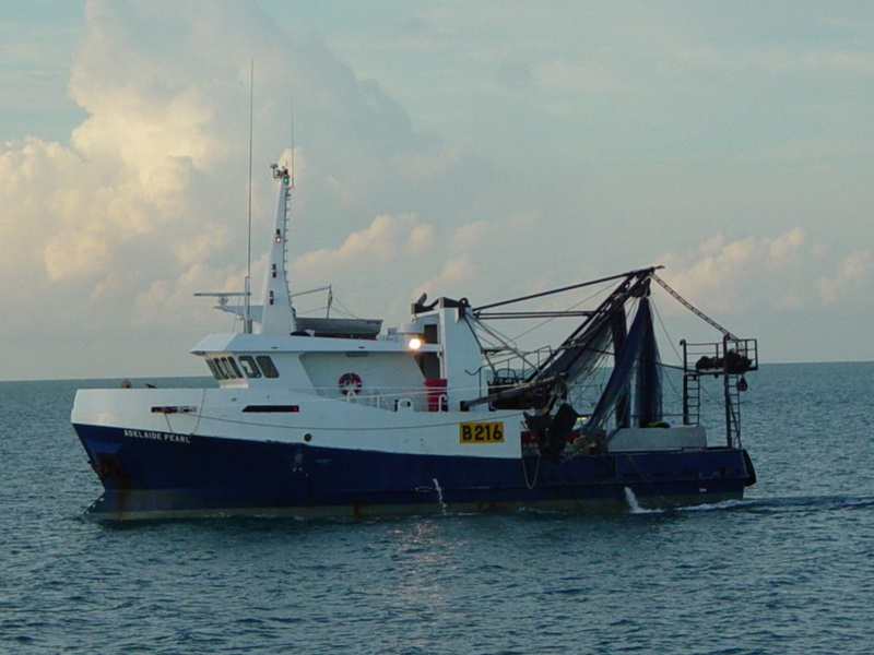 A prawn trawler, viewed from the side.