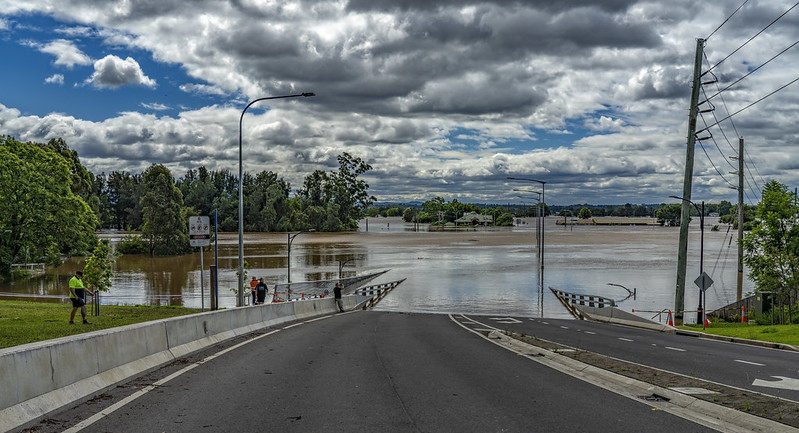 Picture of Windsor Bridge disappearing into flood waters in March 2022.