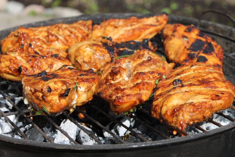 Chicken thighs on a grill