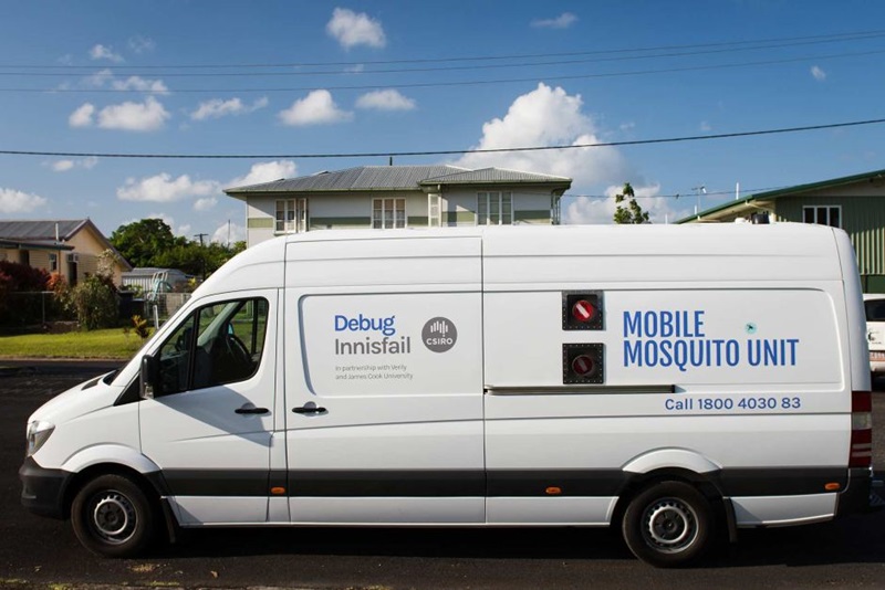 A white van with Mobile Mosquito Unit painted on the side.