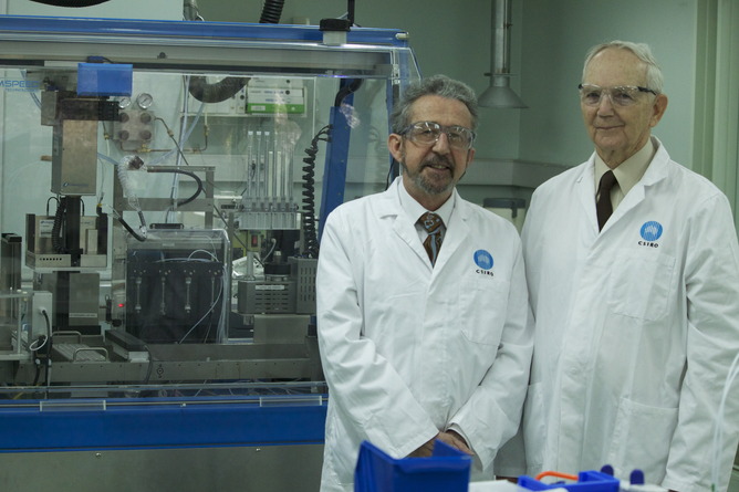 Dr Ezio Rizzardo and Professor David Solomon standing in the lab.