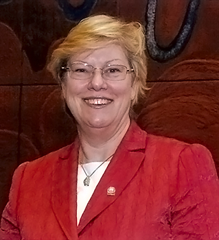 Head and shoulders photograph of Dr Megan Clark.